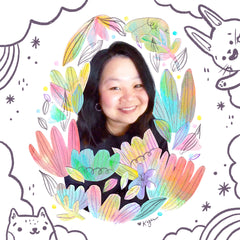 Photo of Cheery Human Studios / Kristina Yu with paper art and illustrations of cute animals around it
