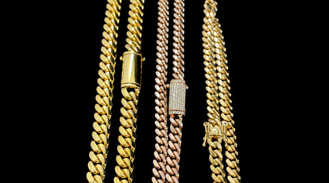 Shown, from left to right. 10mm gold sleek lock, 7mm diamond sleek lock, 7mm cuban link box clasp.