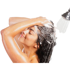 woman washing hair with shampoo and conditioner bar valhalla spa organics