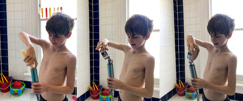 kid installing shower head