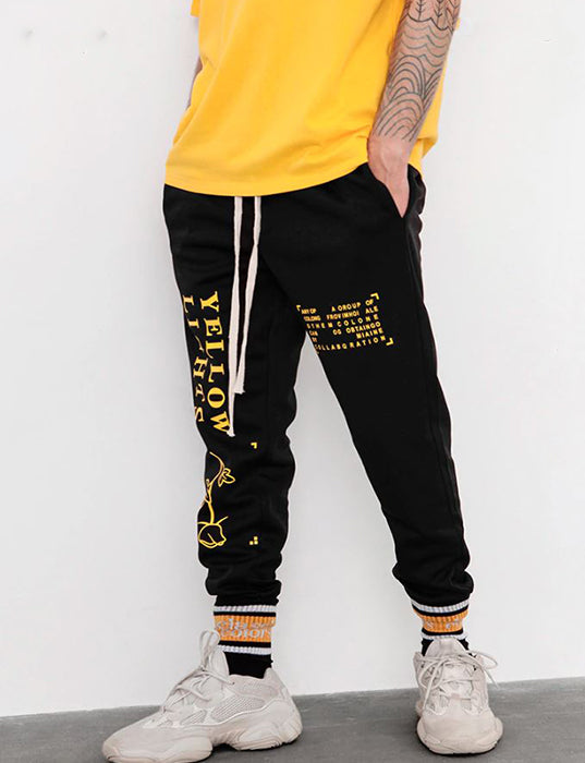 yellow and black sweatpants