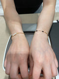 a permanent bracelet per hand