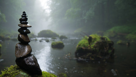 cairn on foggy lake