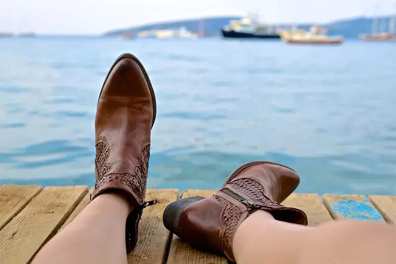 leather boots near water