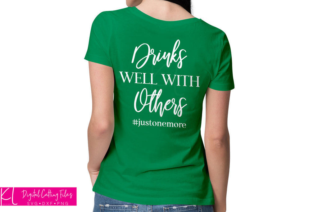 St. Patrick's Day shirt in green with the Drinks Well with Others svg quote on the back in white vinyl