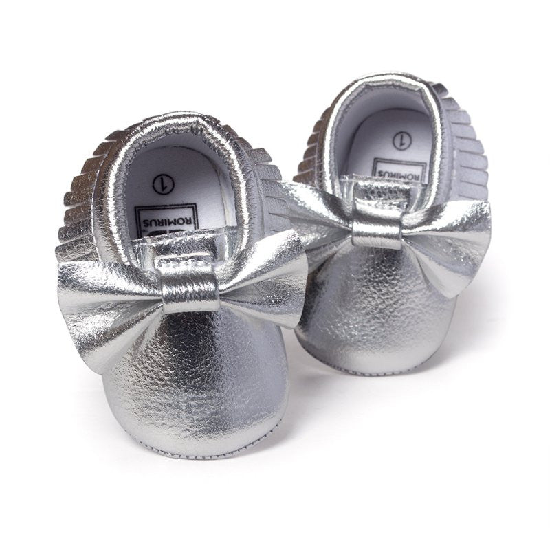 white soft bottom baby shoes