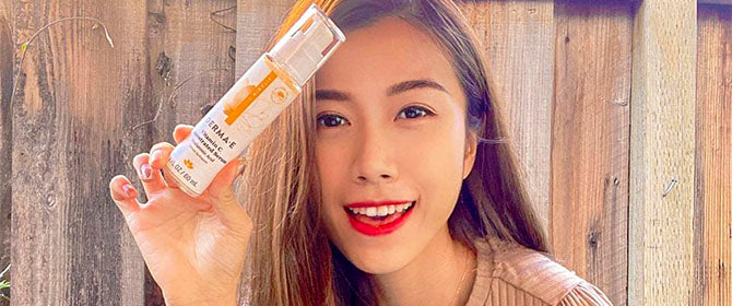 Woman holding Vitamin C Concentrated Serum