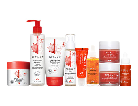 Line up of DERMA E's retinol anti-aging skincare line with a moisturizer, cleanser, scrub, serum, facial oil, day cream, and retinol concentrated serum