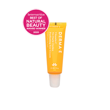 Yellow eye cream tube of DERMA E's Vitamin C No Dark Circles Perfecting Eye Cream next to box