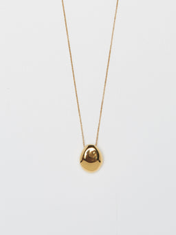 Cropped flat lay view of Gold Orb Necklace Necklace bagatiba 