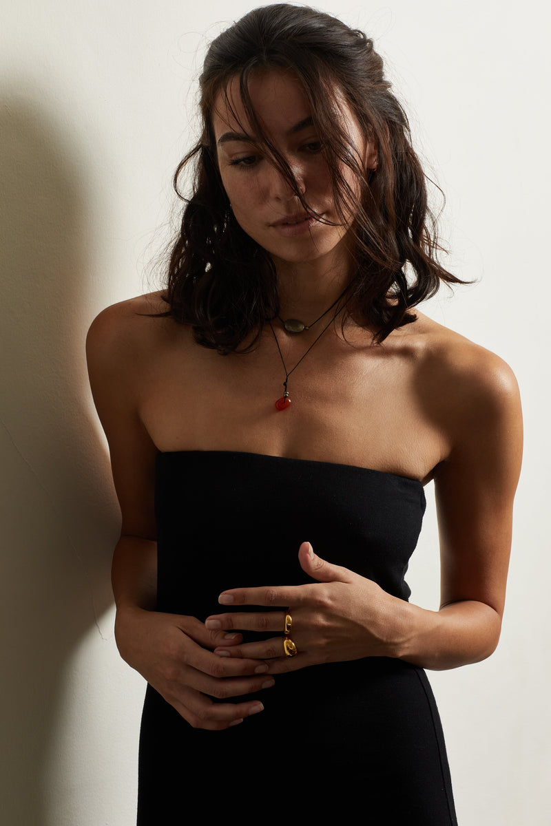 Oval Pyrite Necklace necklace moody portrait of model wearing bagatiba necklaces and rings