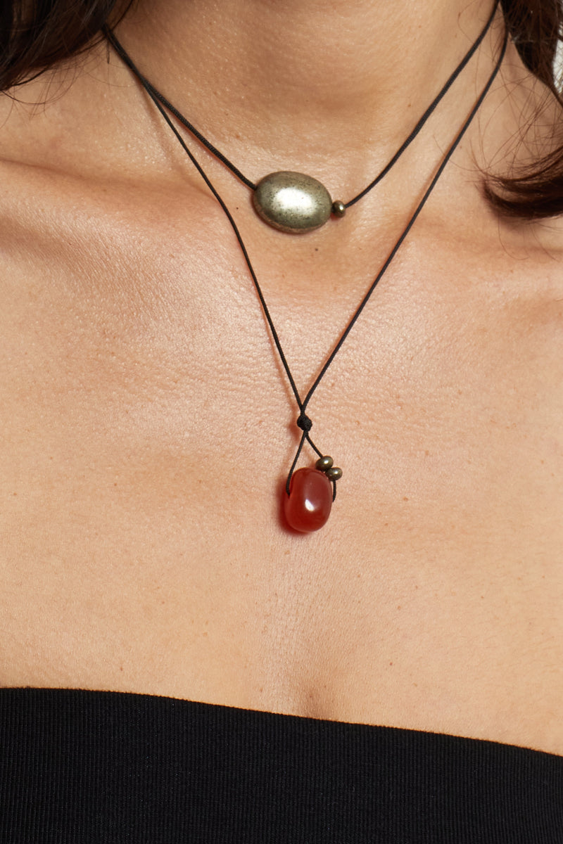 Oval Pyrite Necklace necklace on model with red agate necklace