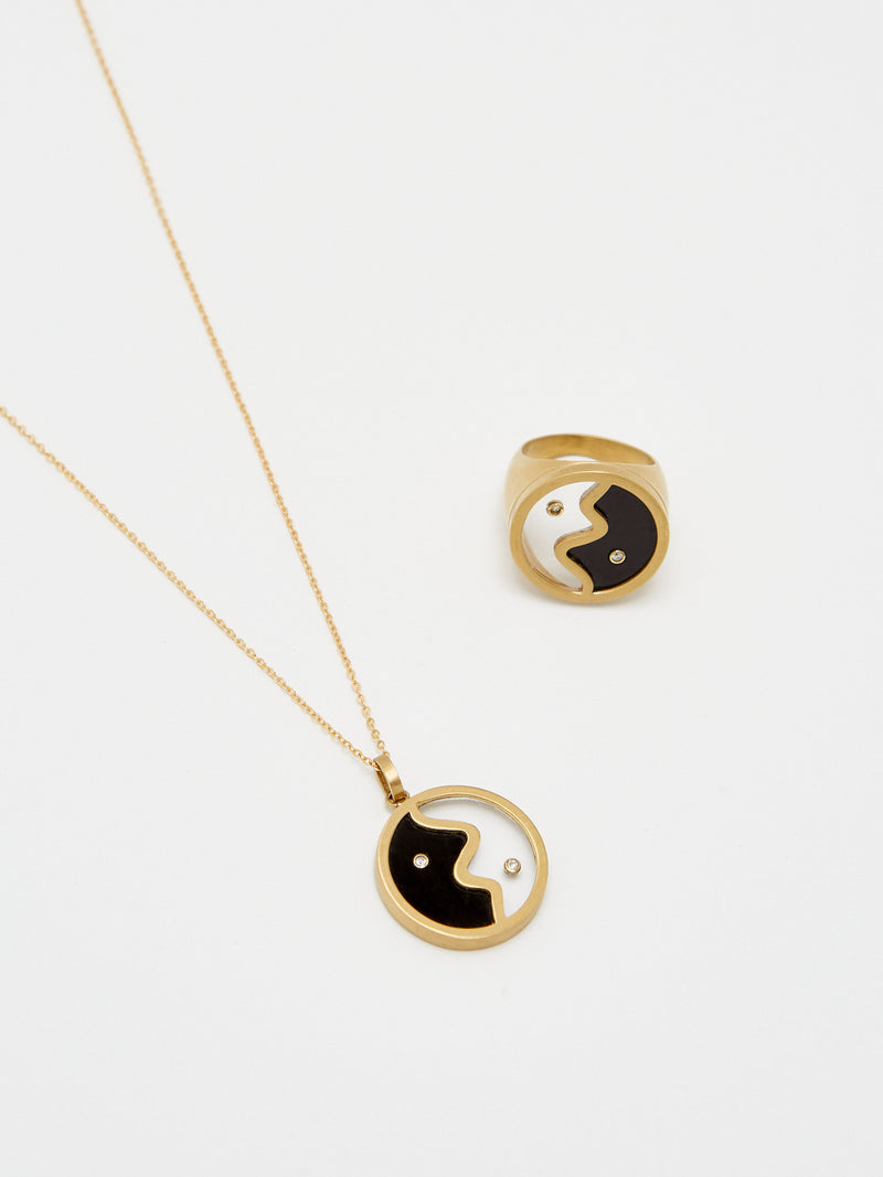 Detail view flat lay of the Yin Yang Glass Necklace and Ring by  bagatiba 