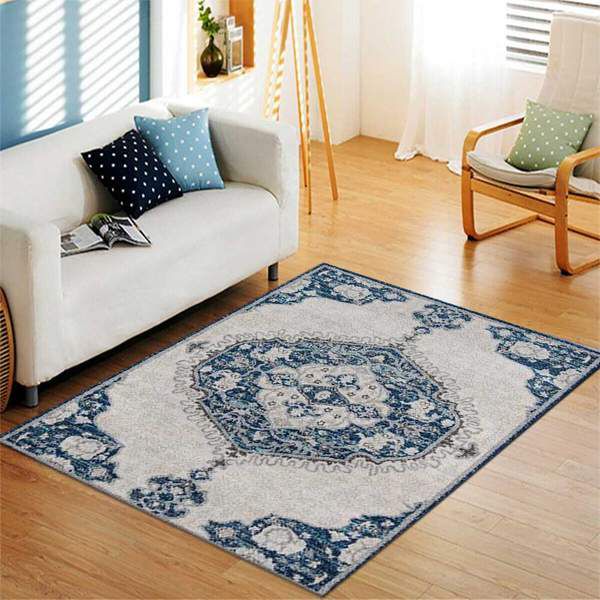 Make the grey rug the focal point of the room