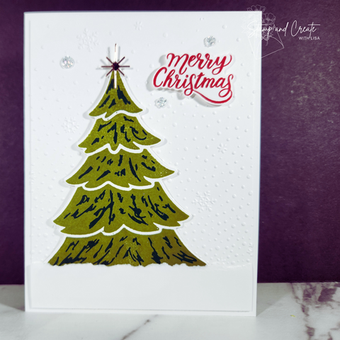 Handmade Christmas card from Glenda Mollet featuring a christmas tree, textured snow background and the words Merry Christmas