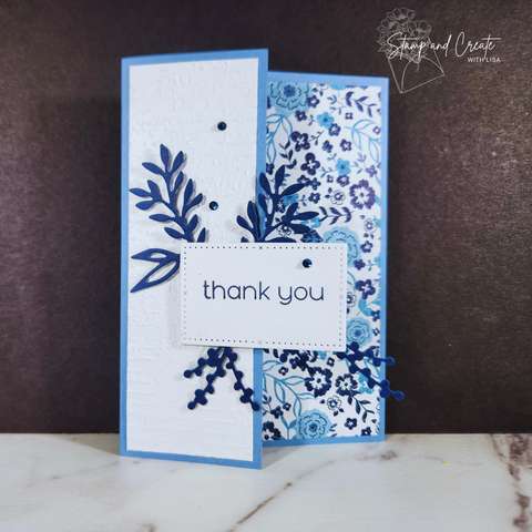 Handmade thank you card from Elizabeth Green featuring blue flowers and stems