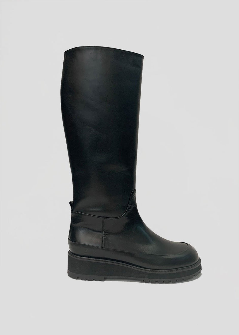 black sole boots