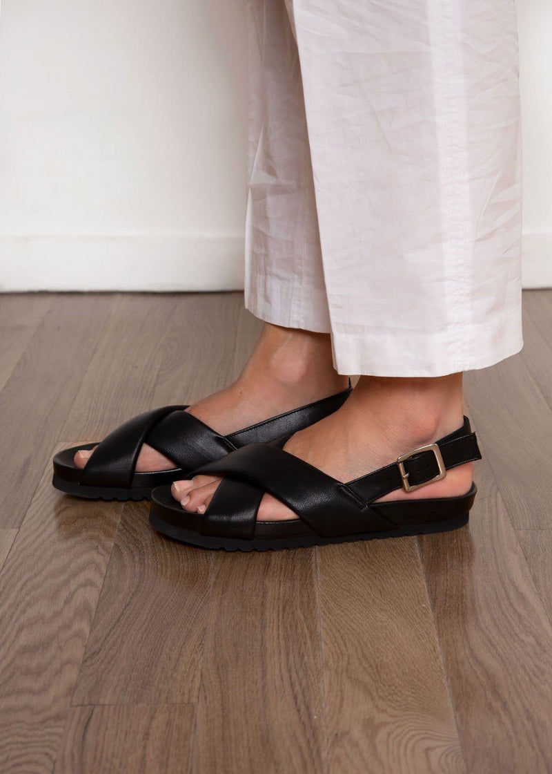 black criss cross flats