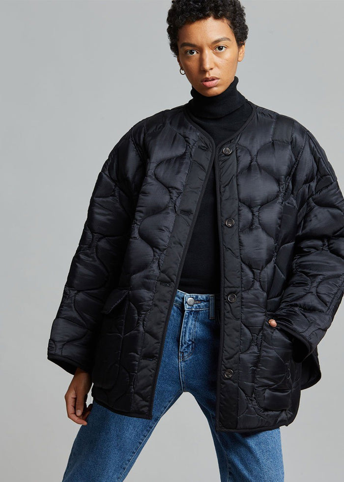 https://cdn.shopify.com/s/files/1/1527/0993/products/teddy-quilted-jacket-black-jacket-the-frankie-shop-772530_700x.jpg?v=1629631410