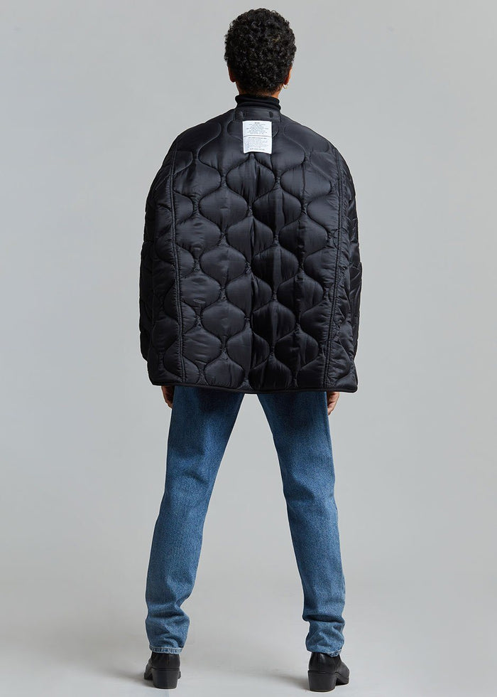 https://cdn.shopify.com/s/files/1/1527/0993/products/teddy-quilted-jacket-black-jacket-the-frankie-shop-813505_700x.jpg?v=1629631415
