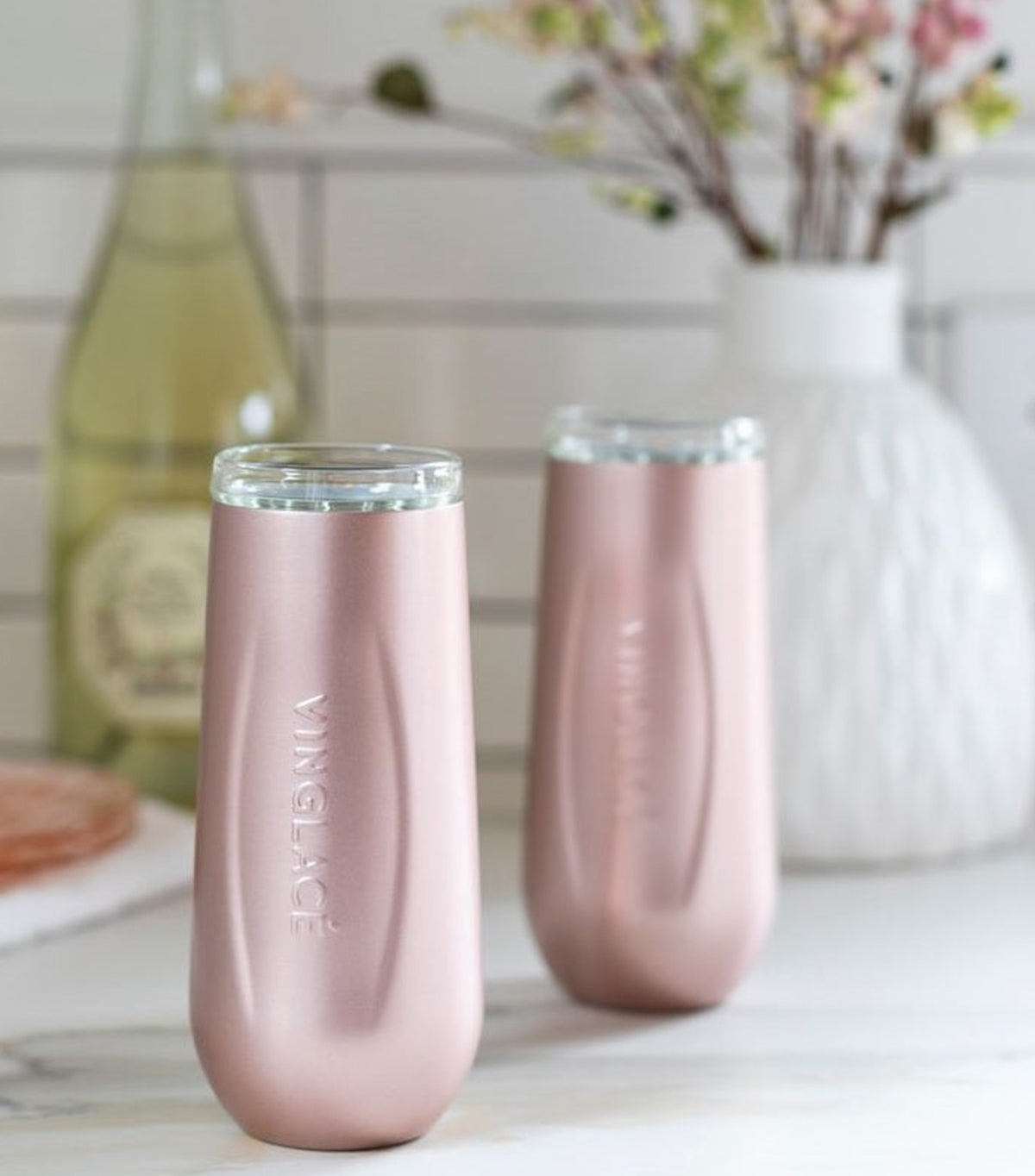 You can now buy insulated champagne flutes with lids