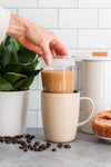 Picture of Coffee Cup in Sand