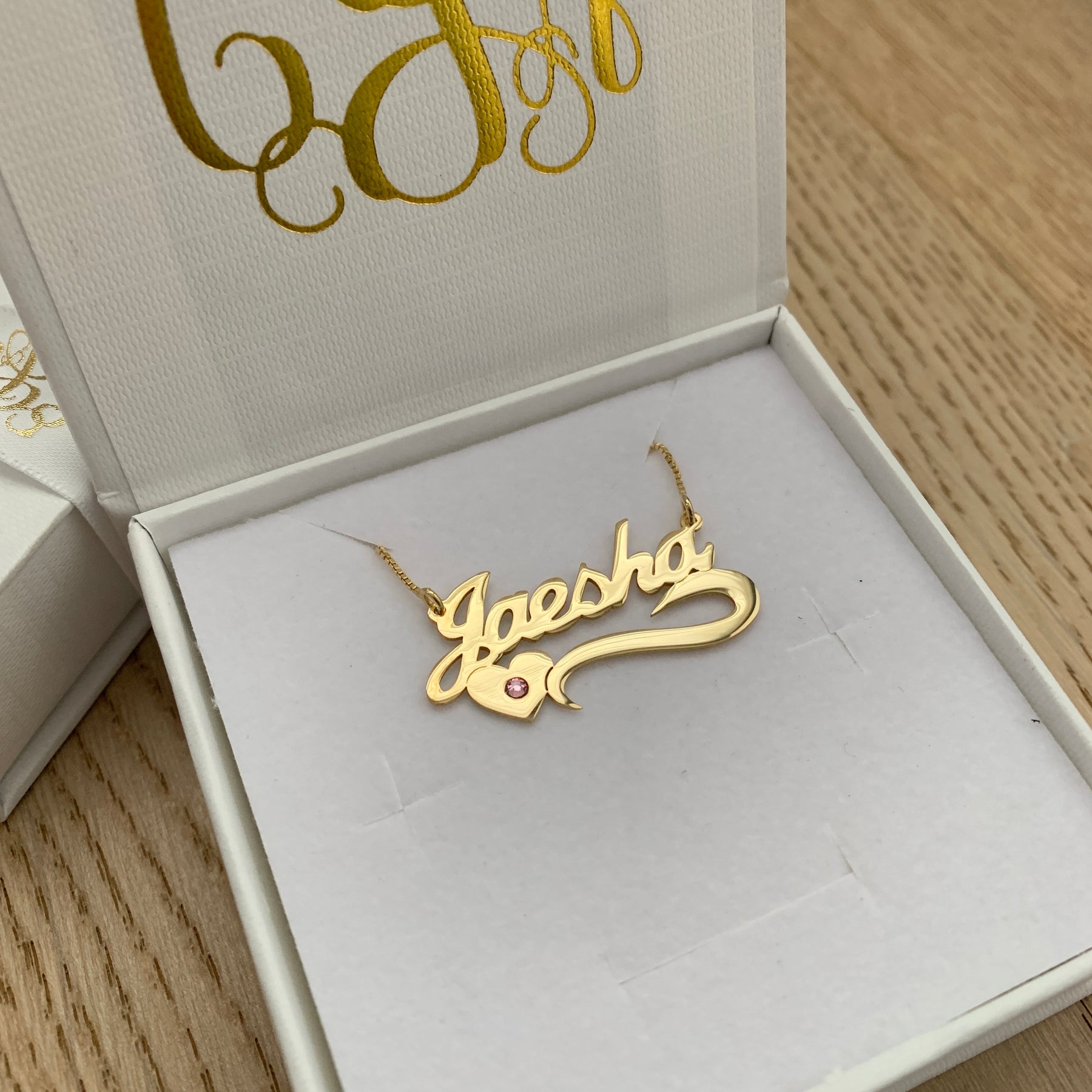 gold name pendant designs for female price