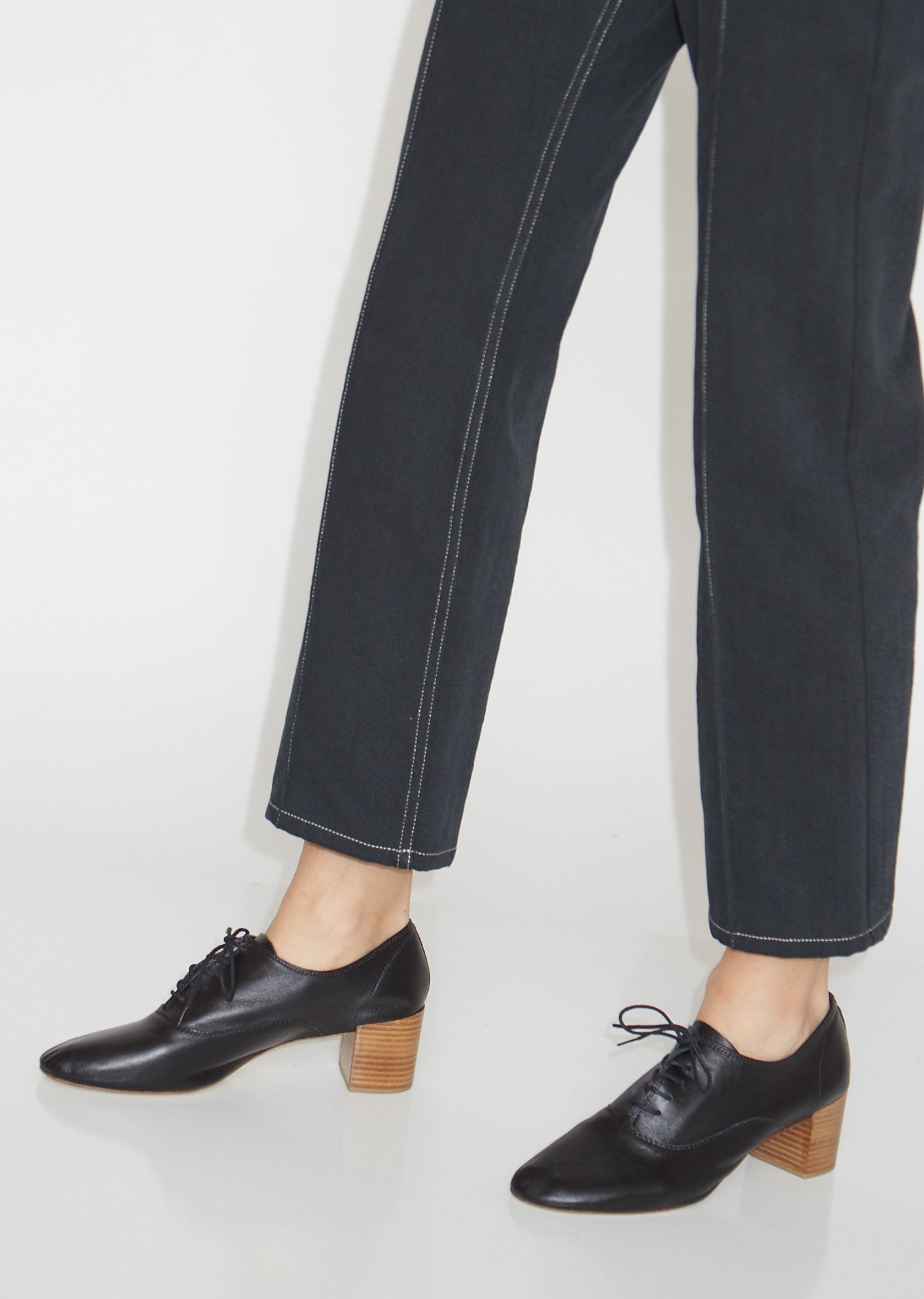 black heeled oxfords