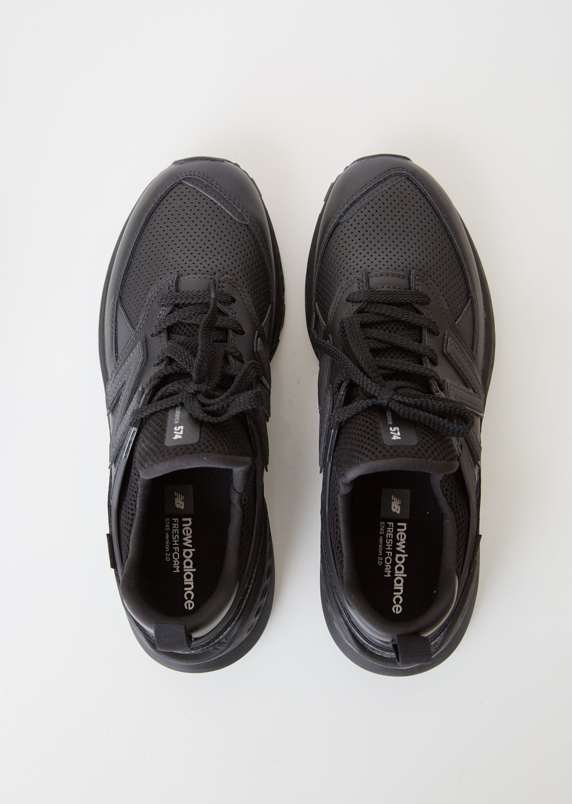 new balance black leather sneakers