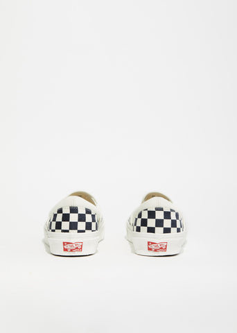 OG Classic Checkerboard Slip-On Sneakers by Vans- La Garçonne