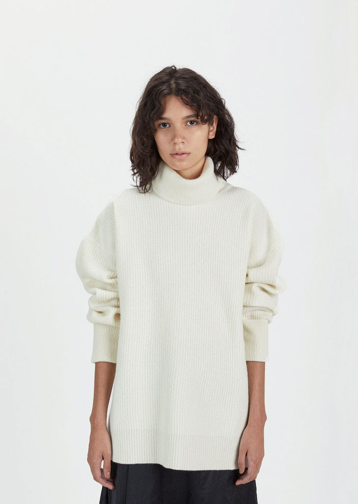 Gauge 7 Long Sleeve Turtleneck Sweater by Maison Margiela- La Garçonne