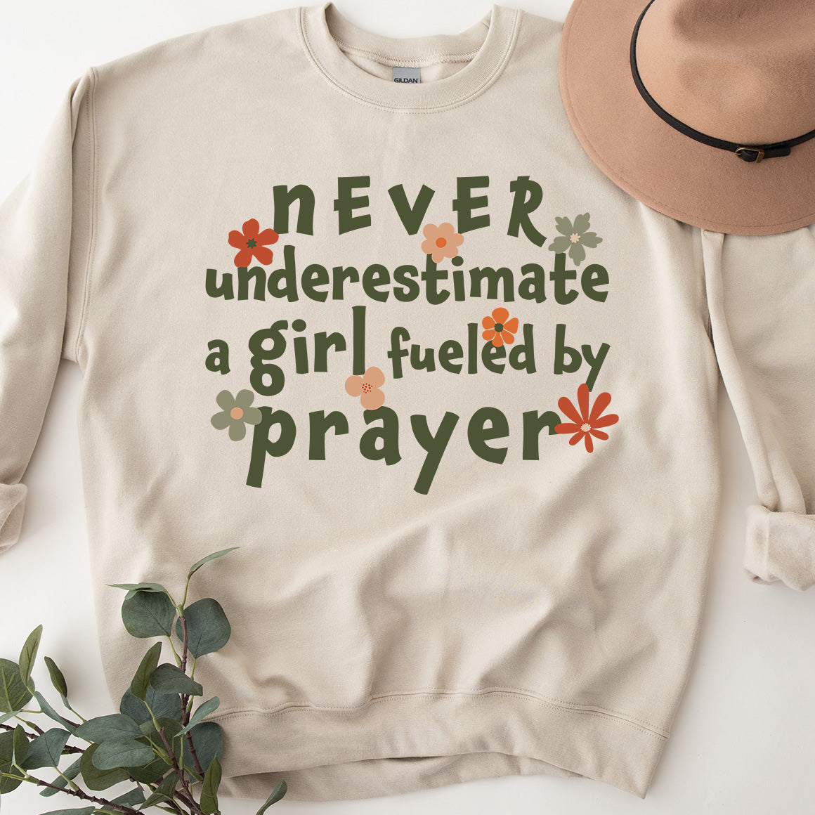 Never Underestimate a Girl Fueled by Prayer Sweatshirt - Doses of Grace product image