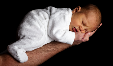 Positions for gassy babies - The Football Hold