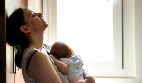 Mother with newborn baby 