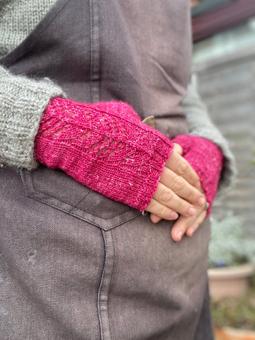 Bright pink fingerless mitts