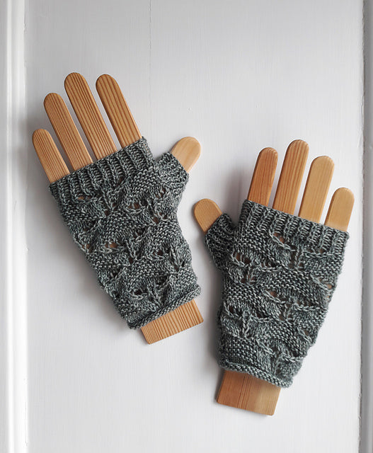 Grey fingerless mitts with a mushroom lace pattern