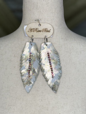 A rare bird  leather feather - Felecia Bella