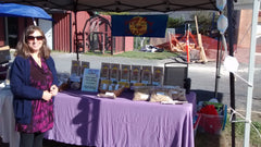 Jessica in the early days of selling Singing Bowl Granola at the farmers' market.