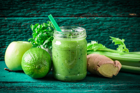 Green Smoothie with spinach, celery, green apple, ginger and lemon