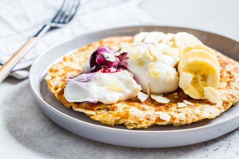 Protein rich breakfast with ommelette or pancake, fruits and cottage cheese