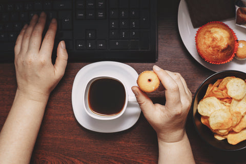 woman surviving on coffee and processed foods and sugary foods