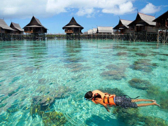 snorkelling around mabul island alone