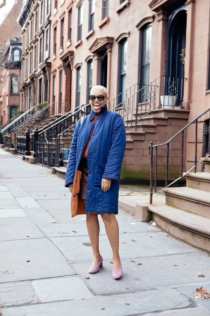 Elise Peterson smiling in the streets of nyc wearing the Narwhal Heel. 