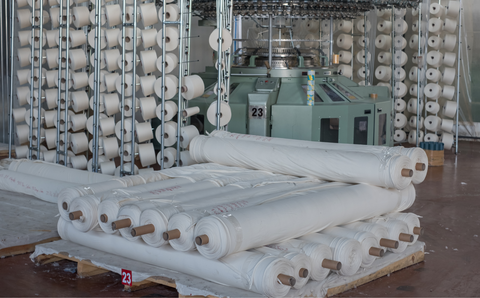 large machine knitting barrels of cotton 