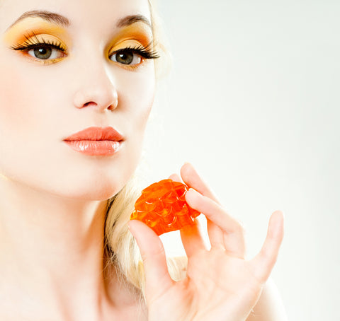 fall beauty trends with colorful eye shadow in orange