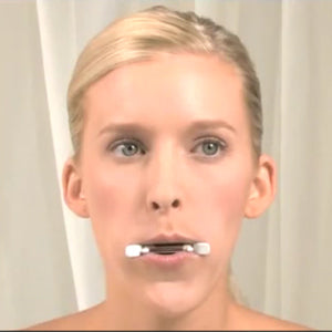 Facial Flex - Woman with Facial Flex in mouth