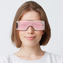 Slightly transparent view of eye massager address undereye puffiness with heat compression.