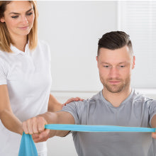 Physical Therapist and Patient Using Body Sport Exercise Bands