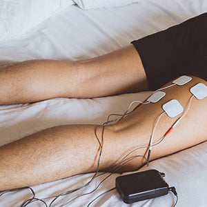 BodyMed Self-Adhering Electrodes  - electrodes on back of leg