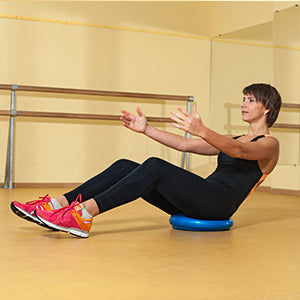 BodyMed Balance Disc - woman working out on disc reverse plank